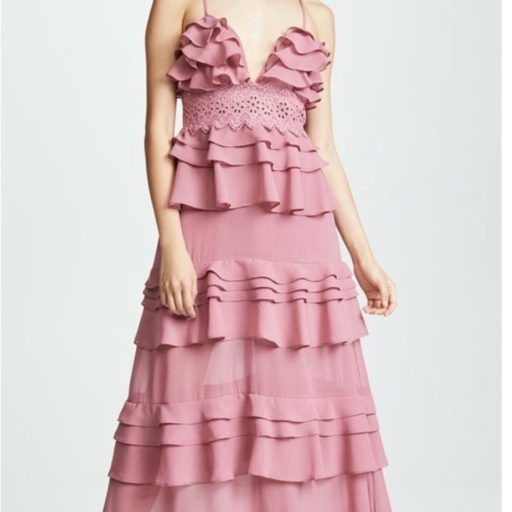 True Decadence floor length ruffle gown
